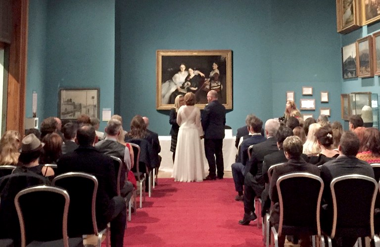 A marriage ceremony in the Picturing Sheffield Gallery at Weston Park Museum