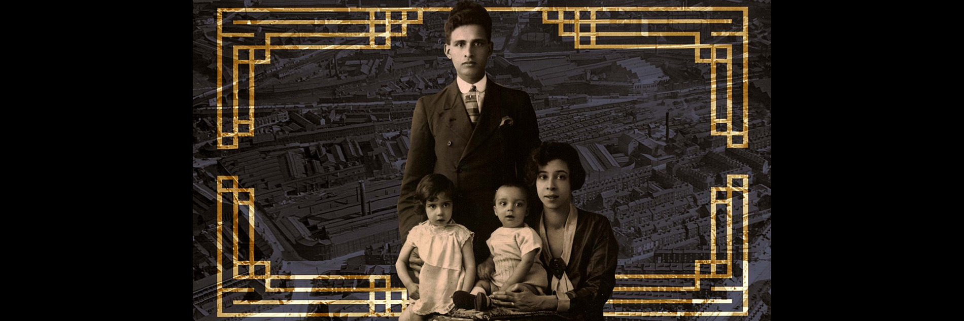 A sepia photograph of two adults, a young child and a toddler.