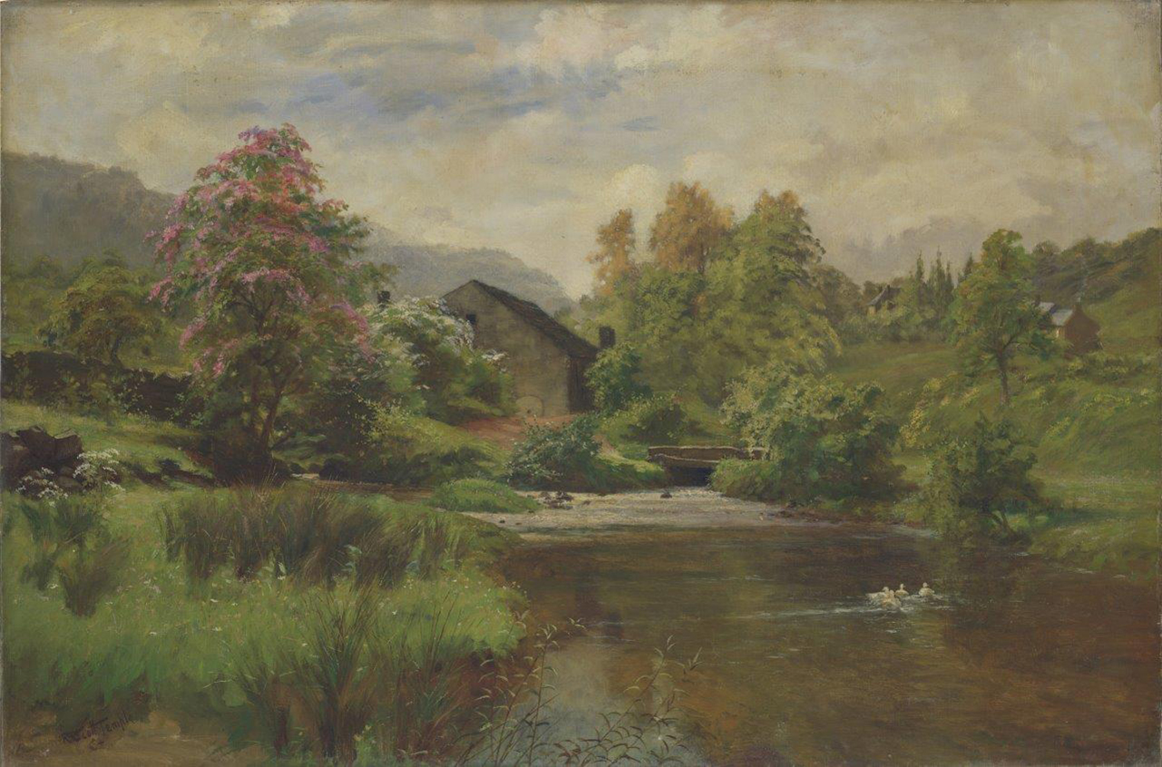 A rural scene showing a river run through green fields and trees. A stone building stands next to the river and a small bridge crosses it. A few further buildings stand on the hillside in the distance.