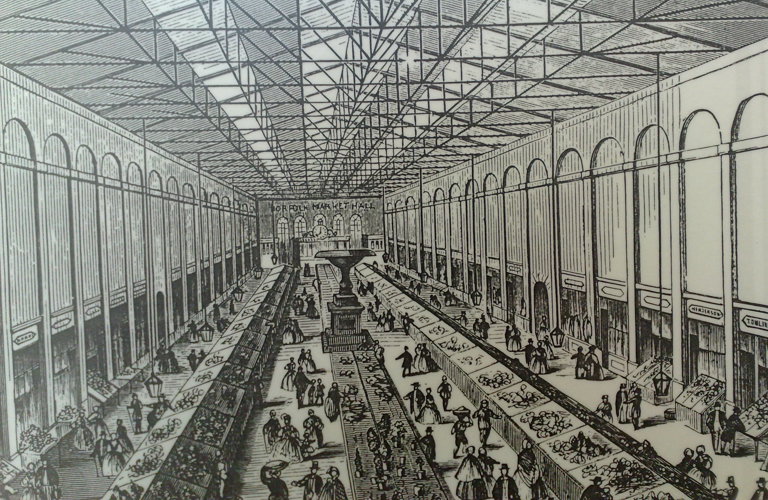 An image of an engraving depicting the inside of Norfolk Market on Castlegate. It's black and white with high ceilings and lots of people milling around at the bottom.