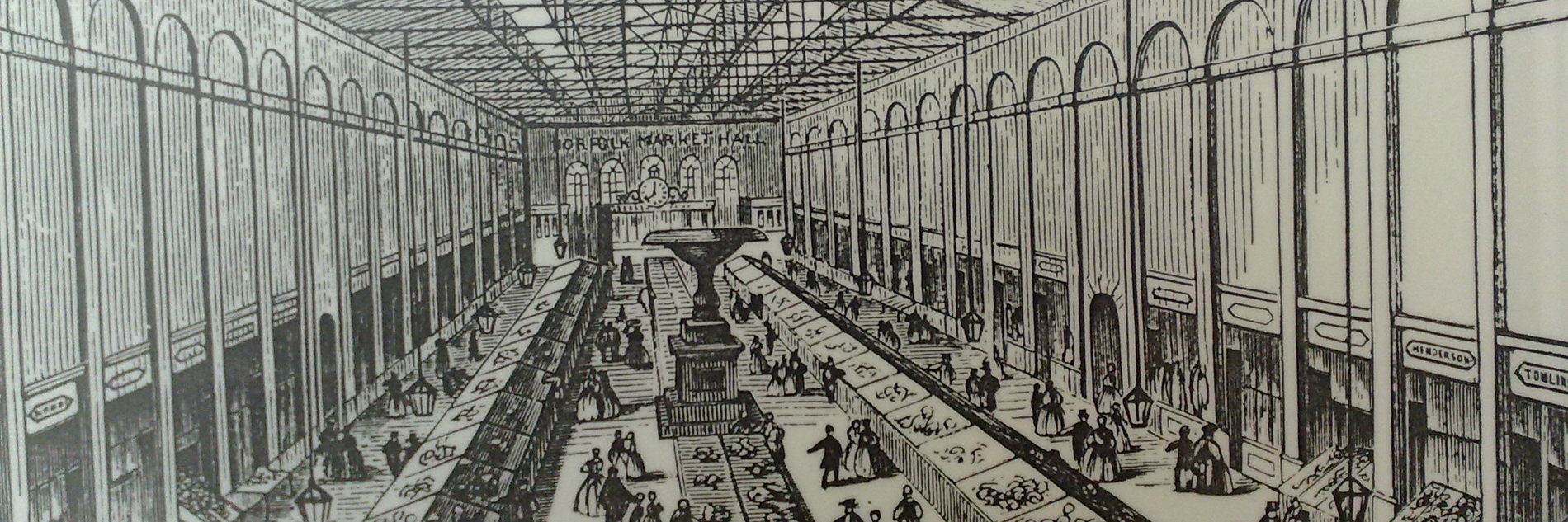 An image of an engraving depicting the inside of Norfolk Market on Castlegate. It's black and white with high ceilings and lots of people milling around at the bottom.