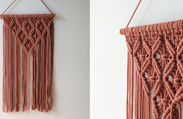 A composite image showing two views of the same macrame wall hanging. It is made of a dusty rose pink yarn, and the knots create a triangle shape coming down. Tassels hang down from the bottom of the triangle, ending in a straight line. The other photo is a more side on view of the same piece. 