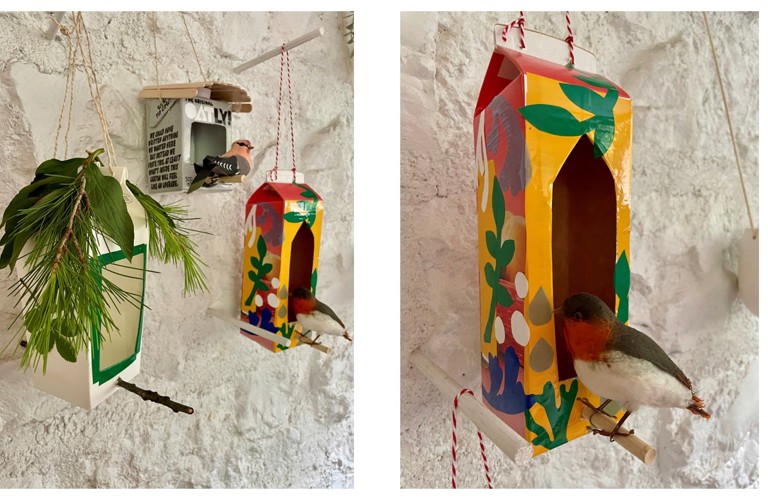 L-R: A photograph of decorated bird feeders made from Tetra Pak juice containers; a bird feeder made from a Tetra Pak juice container with a toy bird perched on the side.  
