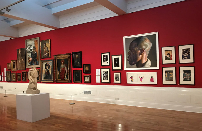 A photograph of the portraiture display at Graves Gallery